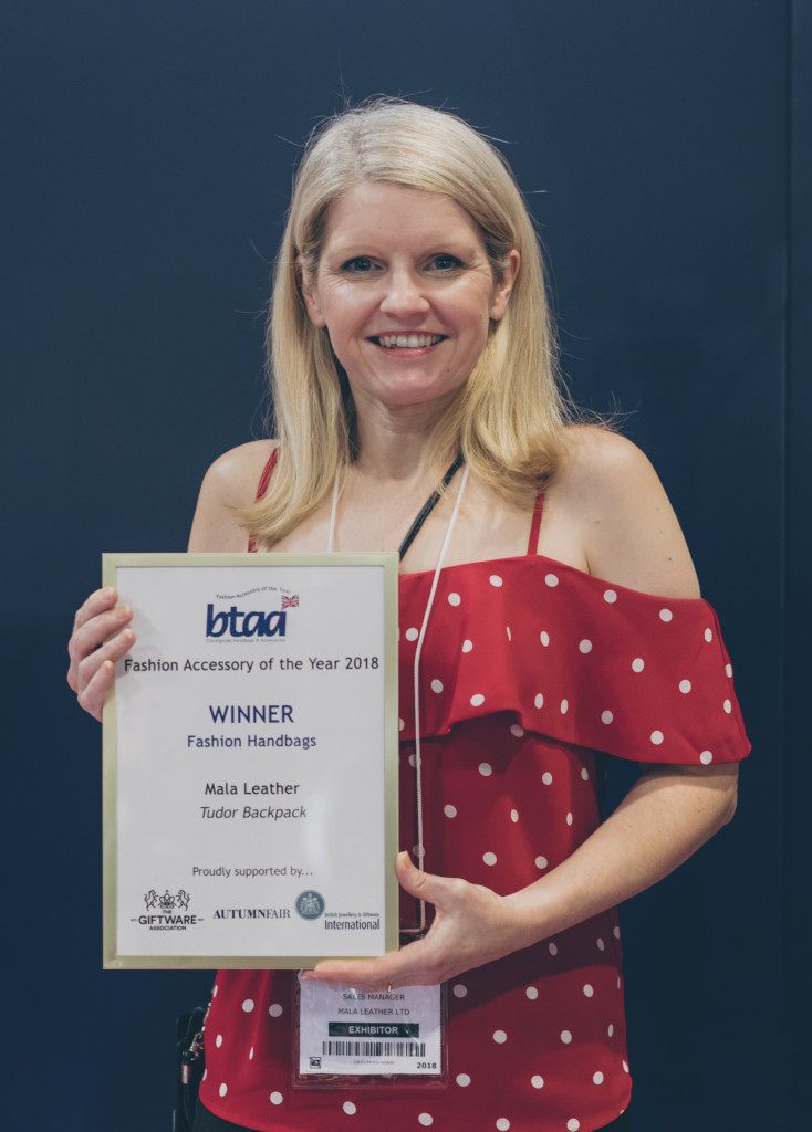 Above: Mala Leather’s Trudy Cox proudly holds the award as winner of the BTAA’s Fashion Handbags category.