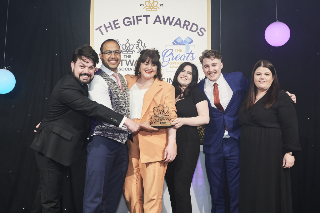 Above: The team from Spice Kitchen joined founder Sanjay Aggarwal on stage to receive their GOTY trophy from Jo Pilcher on behalf of Pink Key Licensing.