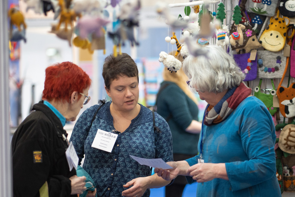 Above: Talking business at last year’s show.