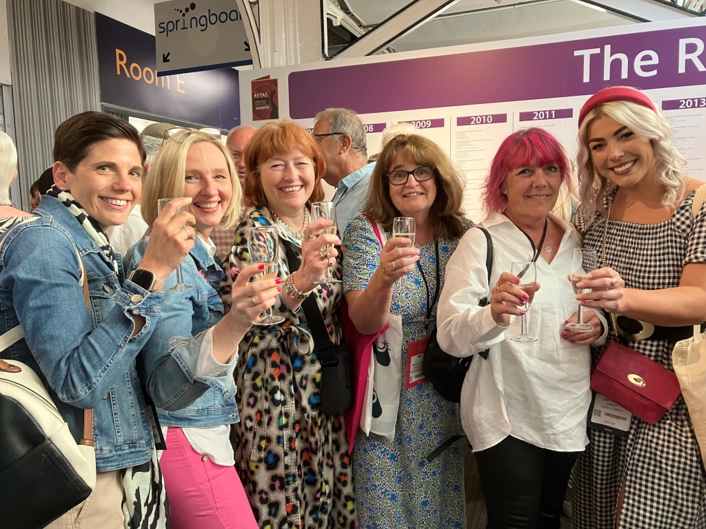 Above: Clinking glasses on the first day of PG Live last year were: from left to right: Highworth Emporium’s Victoria Packford and Aga Marsden; Jo Amor’s Jo Webber; Expressions, Cat’s Whiskers and Polkadot’s Tracey Bryant; Etcetera’s Katrina Raill, and Lovely Libby’s Libby Holden.