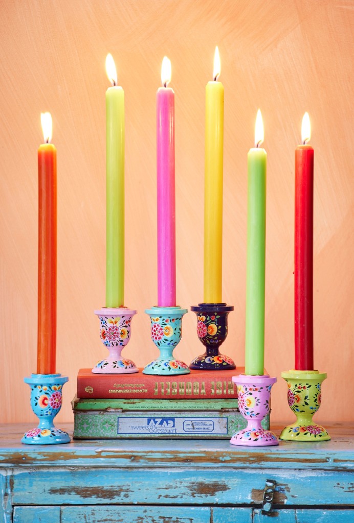 Above: Colourful candles and candle holders.
