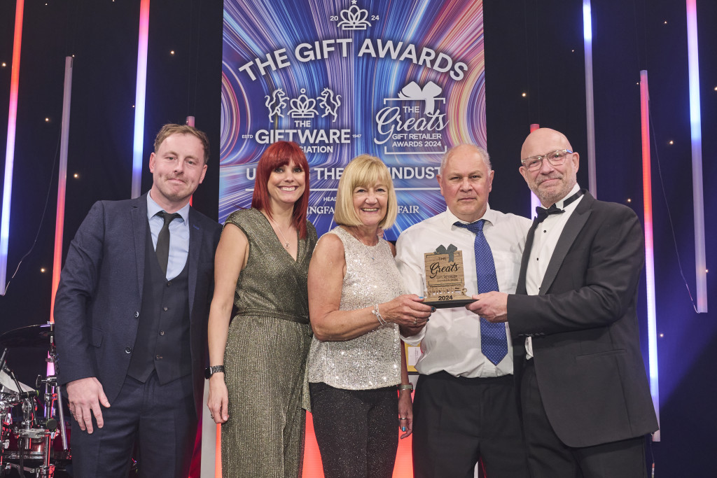 Above: Phil Verrills, global sales director of Gift Republic, category sponsor, presented the winning Greats trophy to Bill & Bert’s co-owners Bill Nettelfield and Sarah Charlton in May. Also on stage is Bill’s daughter, Amy Myer, the shop’s social media guru. Comedian and Awards compere Andrew Ryan is shown on the left.