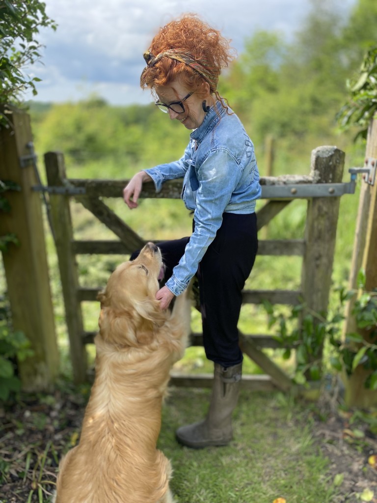 Above: Sue Ballard with her Golden Retriever Wilbur, the inspiration behind the candles and the Tales & Treats brand.