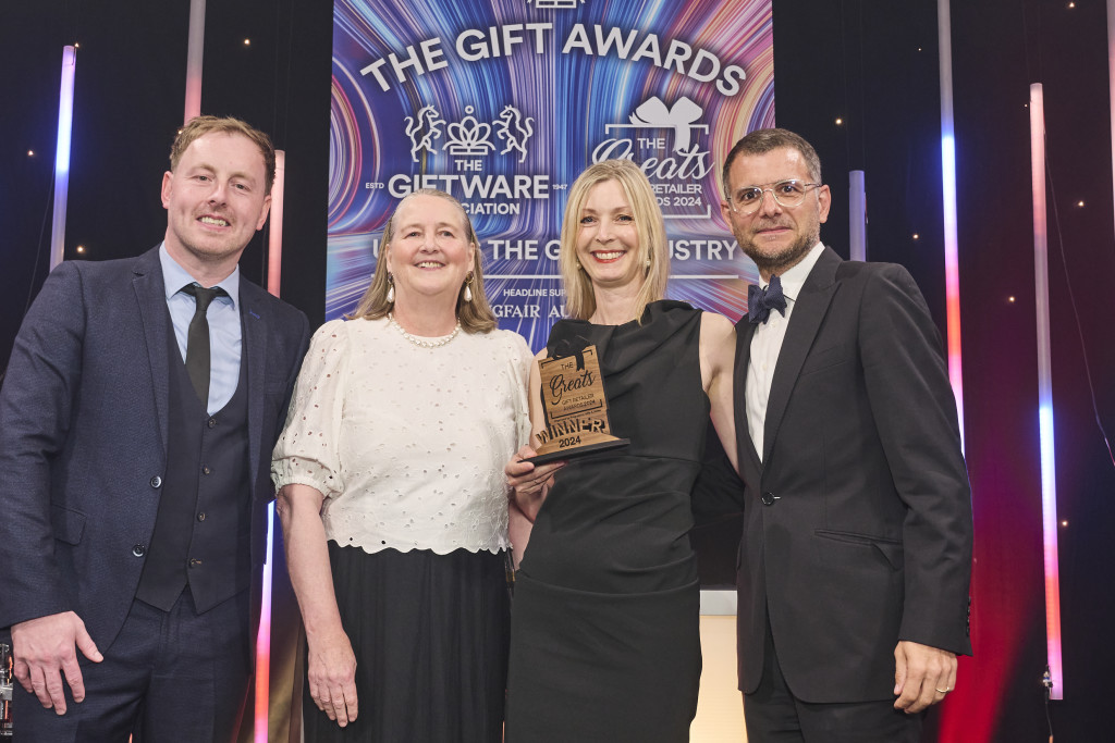 Above:  Nicola Hibon Jackson, owner of The Voewood, received her Greats trophy from Clare Harris, founder of Talking Tables, category sponsor. On stage with Nicola is her husband, Bastien Hibon.