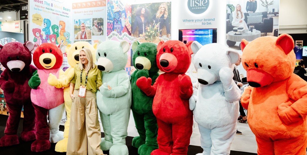 Above: Sarah Davies (centre) poses for a photo with the Mood Bears, a company that, as a ‘Dragon’ she invests in. 