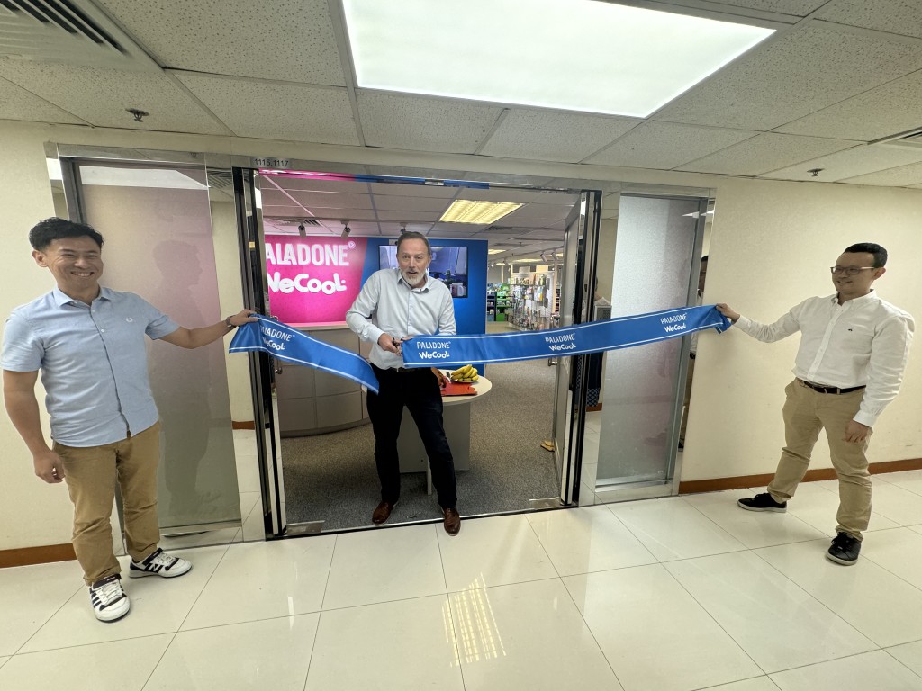 Above: Cutting the ribbon at the new showroom opening were, from left to right: Henry Lam, general manager, Paladone WeCool Hong Kong; Jim Downey, ceo, Paladone WeCool (centre), and Dimitri Ting, director of Sourcing.