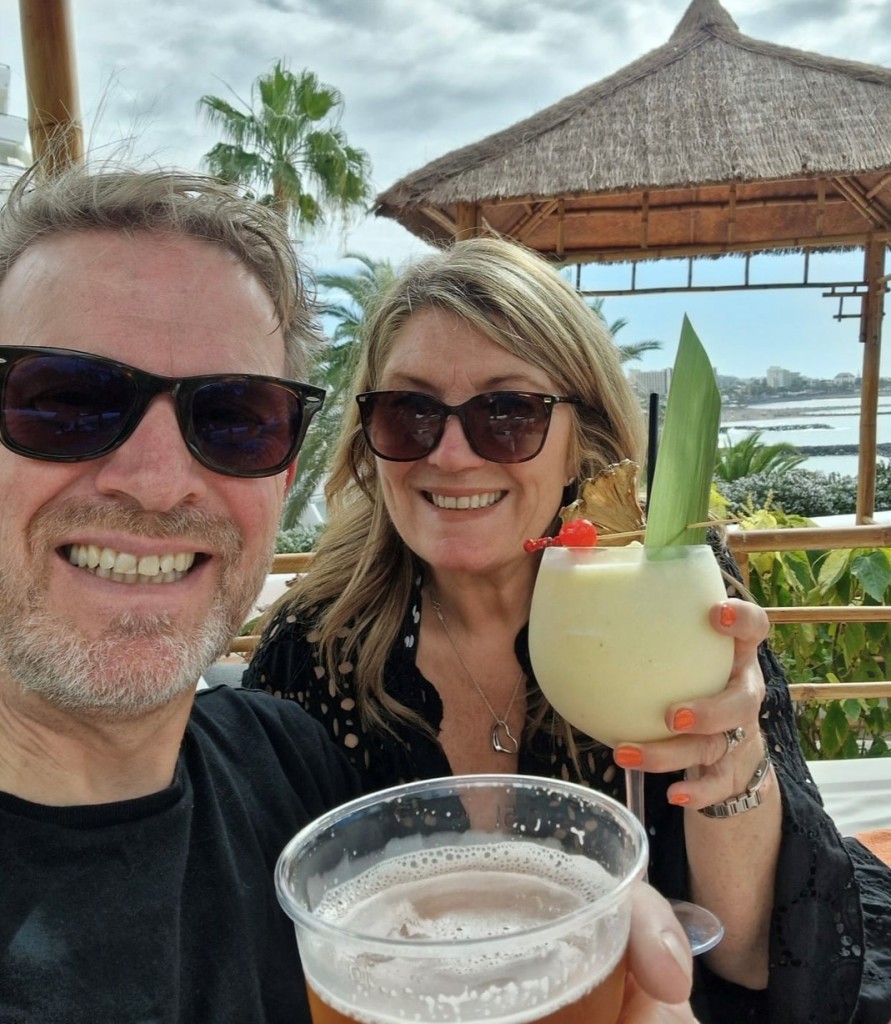 Above: Hugs & Kisses’ owners Caroline Ranwell, with her husband Jon, on holiday in Tenerife, celebrated the ‘Greats’ news with a cocktail!